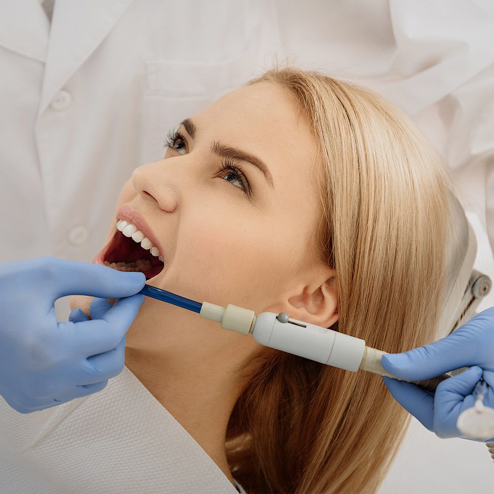 Patient receiving dental treatment