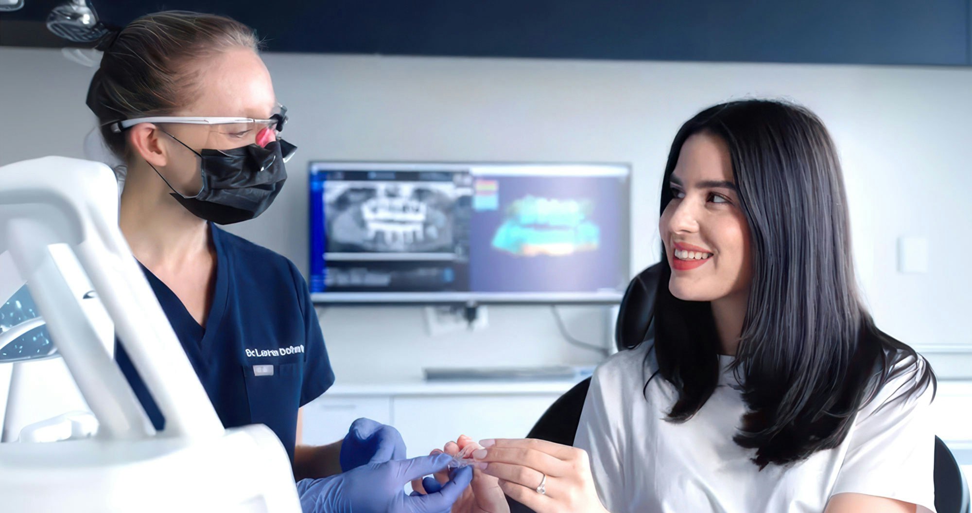 Enlighten Dental team member and patient