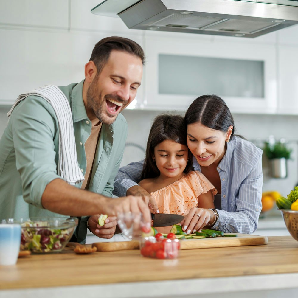 family making a healthy meal together