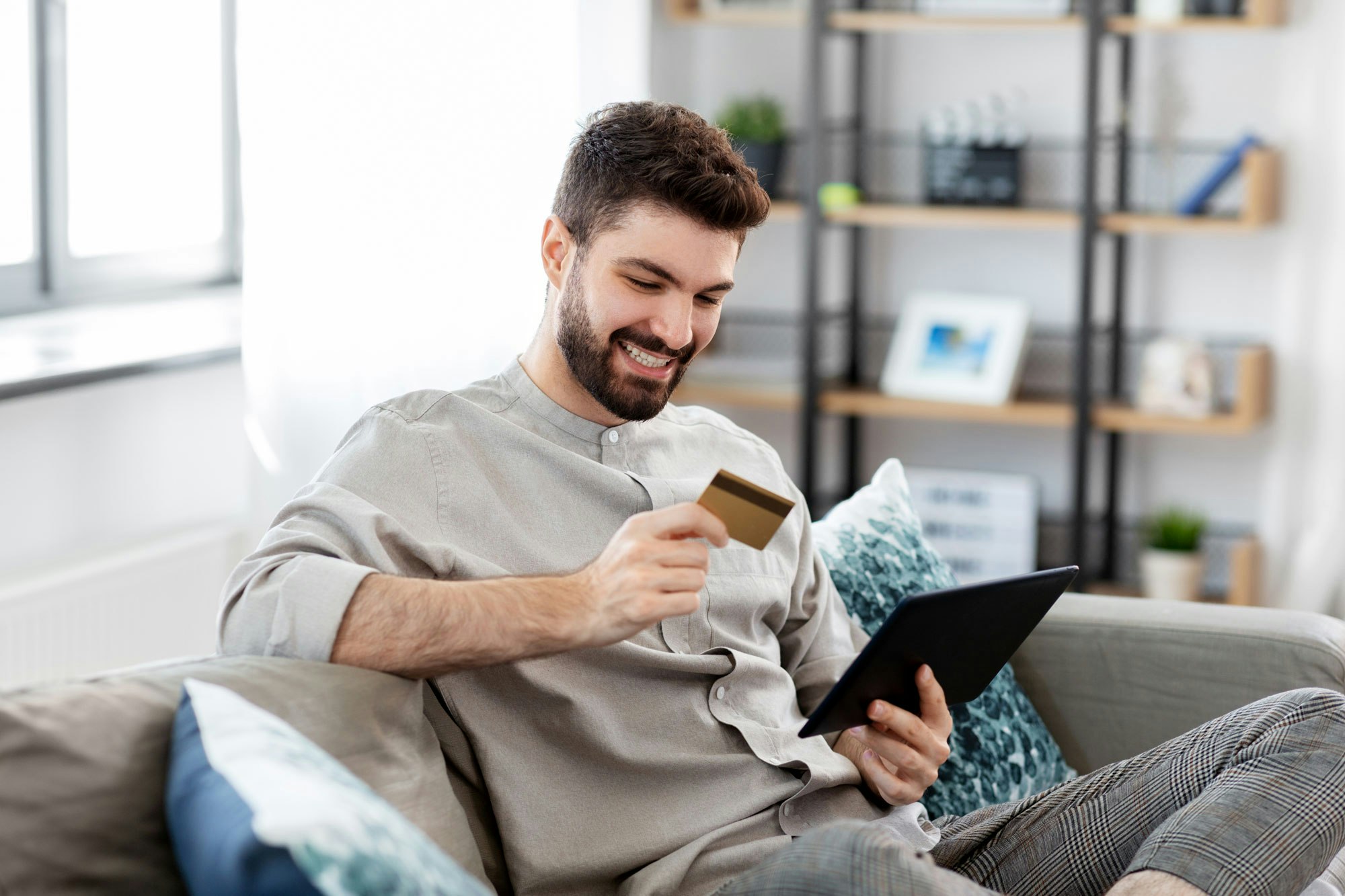 man paying for dental care online