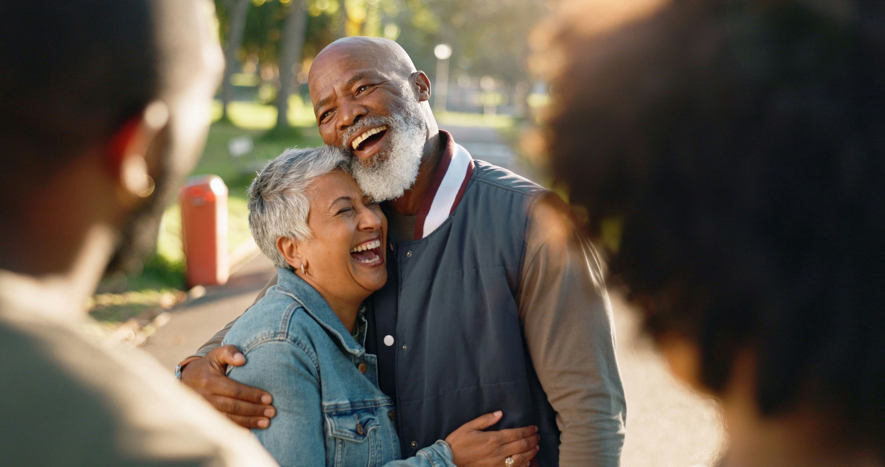 mature couple smiling and hugging