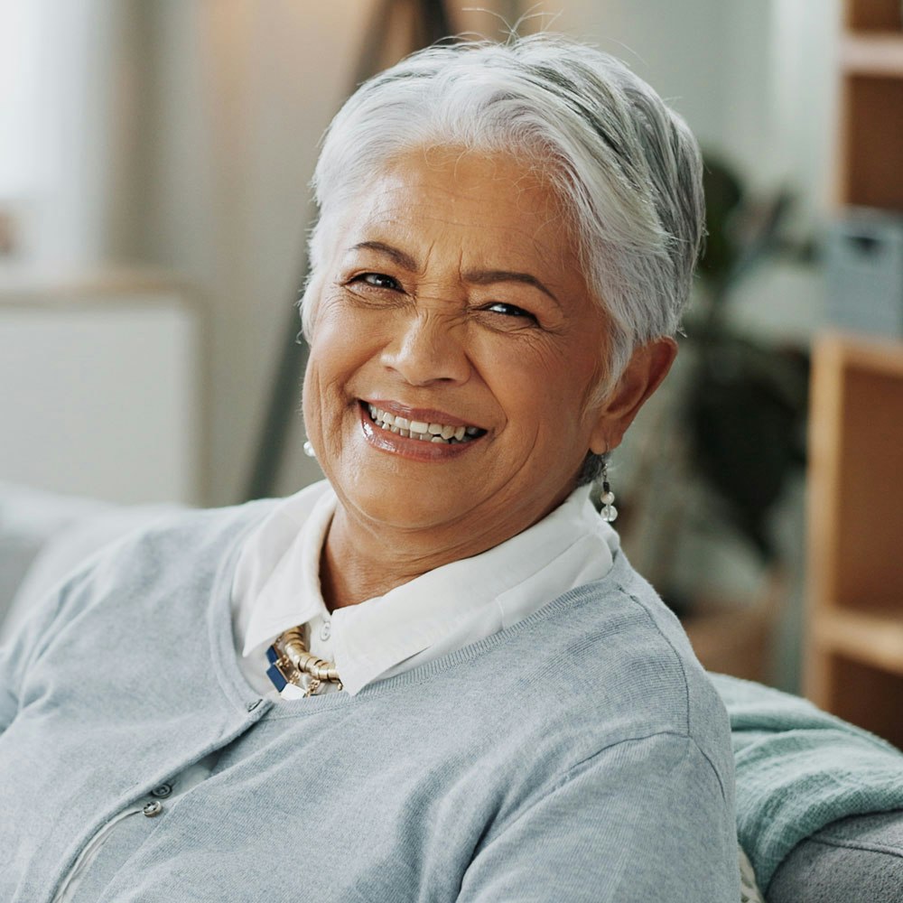 mature woman with dental implants
