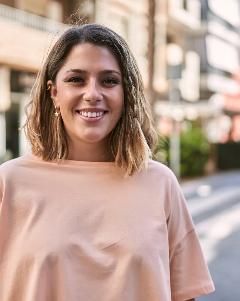 Enlighten Dental dentist examining a smiling patient