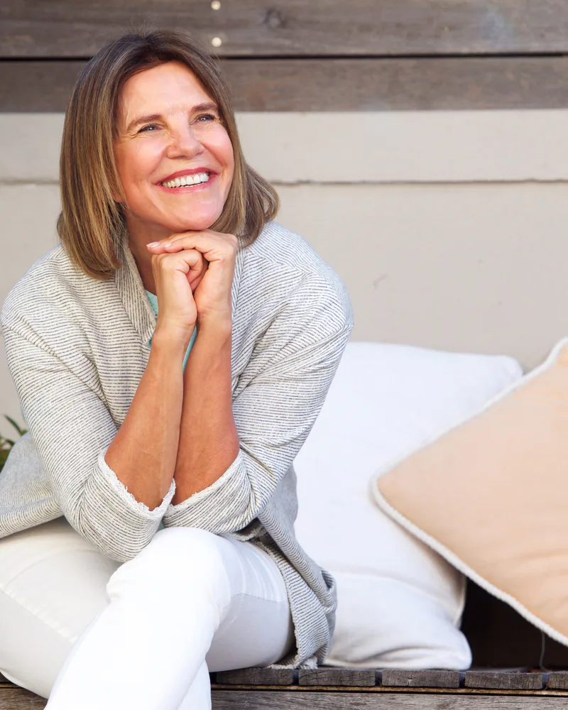 Dentist treating gum disease at Enlighten Dental