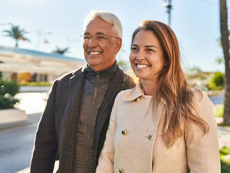 Happy elderly person smiling confidently