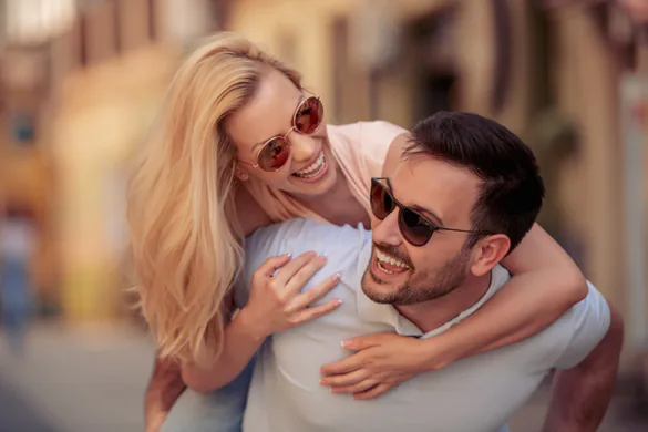 A dental pick scraping the teeth