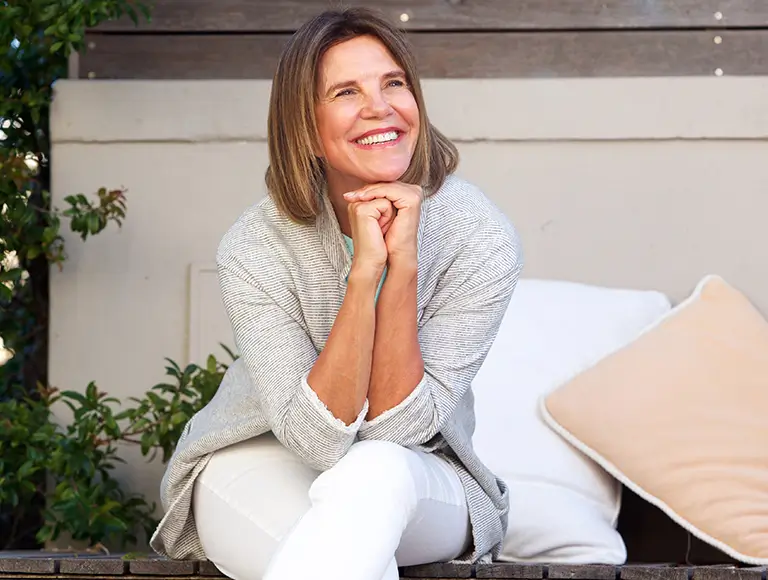 Senior person smiling confidently