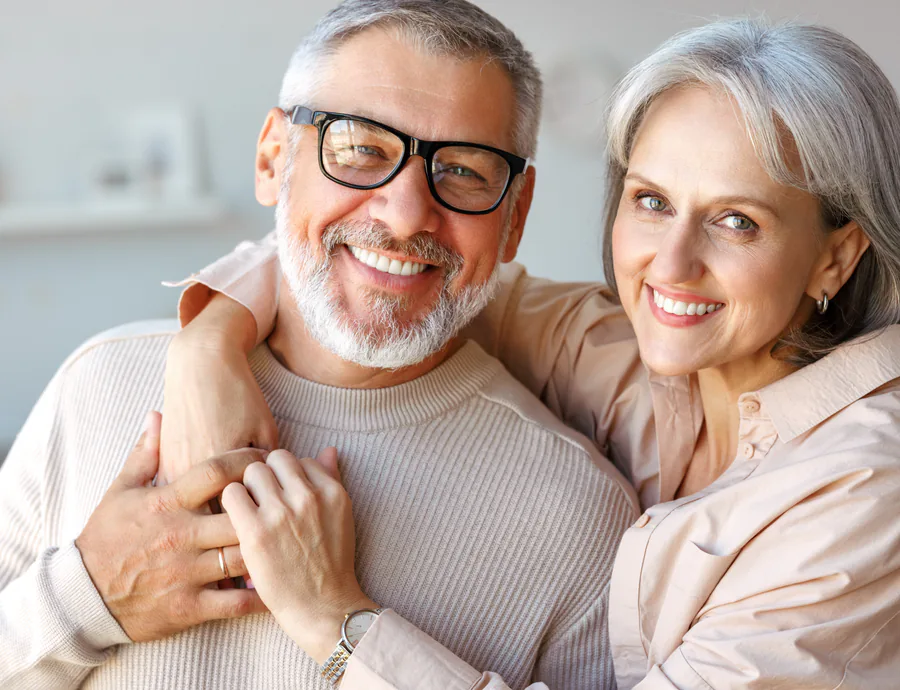 Elderly person smiling happily