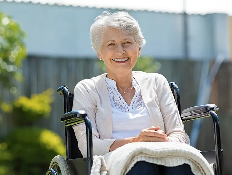 Older person smiling brightly